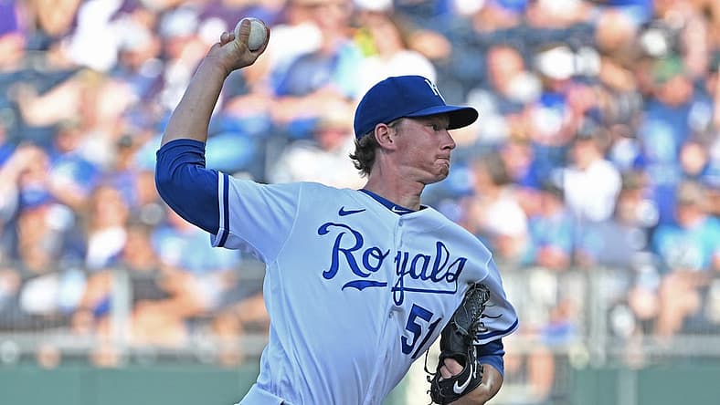 Jul 23, 2022; Kansas City, Missouri, USA;  Kansas City Royals starting pitcher Brady Singer (51) delivers against the Tampa Bay Rays during the first inning at Kauffman Stadium. Mandatory Credit: Peter Aiken-USA TODAY Sports