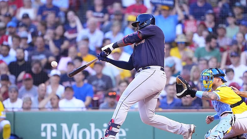 Jul 25, 2022; Boston, Massachusetts, USA; Cleveland Guardians designated hitter Franmil Reyes (32) hits a single against the Boston Red Sox during the second inning at Fenway Park. Mandatory Credit: Gregory Fisher-USA TODAY Sports