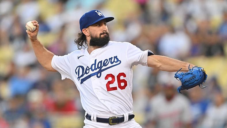 Jul 25, 2022; Los Angeles, California, USA; Los Angeles Dodgers starting pitcher Tony Gonsolin (26) throws a pitch in the second inning against the Washington Nationals at Dodger Stadium. Mandatory Credit: Jayne Kamin-Oncea-USA TODAY Sports
