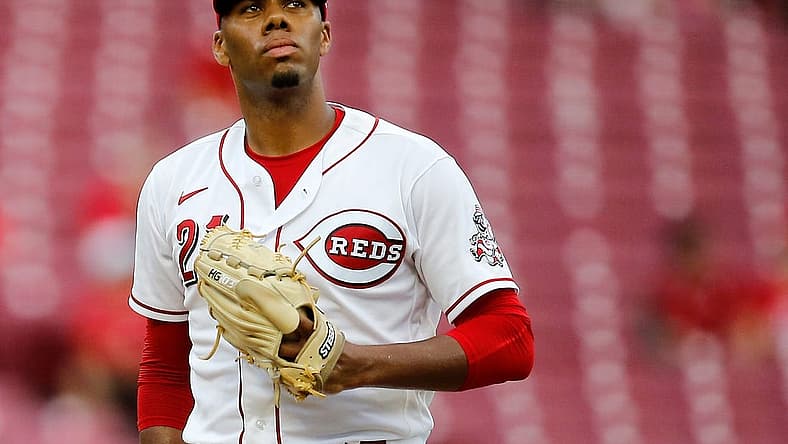 Cincinnati Reds starting pitcher Hunter Greene (21) resets between pitches in the fourth inning of the MLB National League game between the Cincinnati Reds and the Miami Marlins at Great American Ball Park in downtown Cincinnati on Tuesday, July 26, 2022.

Miami Marlins At Cincinnati Reds