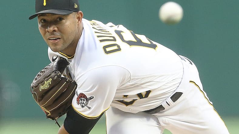 Jul 23, 2022; Pittsburgh, Pennsylvania, USA; Pittsburgh Pirates starting pitcher Jose Quintana (62) throws a warm-up pitch against the Miami Marlins during the first inning at PNC Park. Mandatory Credit: Charles LeClaire-USA TODAY Sports
