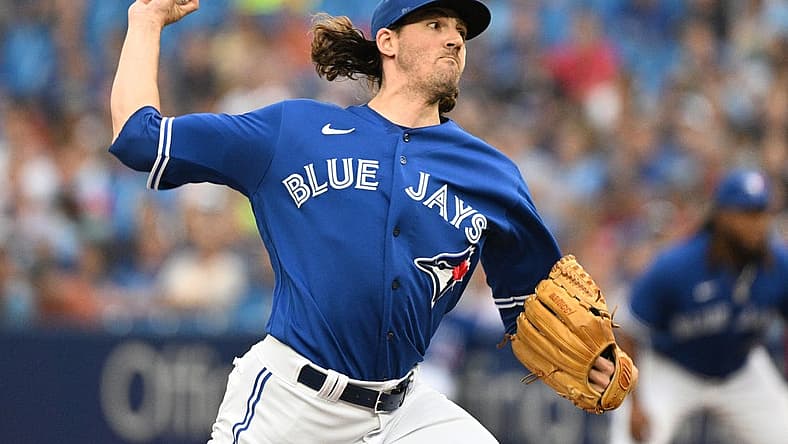 Jul 27, 2022; Toronto, Ontario, CAN; Toronto Blue Jays starting pitcher Kevin Gausman (34) delivers a pitch against the St. Louis Cardinals in the first inning at Rogers Centre. Mandatory Credit: Dan Hamilton-USA TODAY Sports