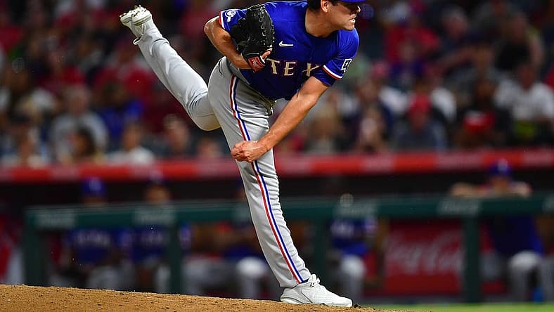 Jul 28, 2022; Anaheim, California, USA; Texas Rangers relief pitcher Matt Moore (45) throws against the Los Angeles Angels during the ninth inning at Angel Stadium. Mandatory Credit: Gary A. Vasquez-USA TODAY Sports