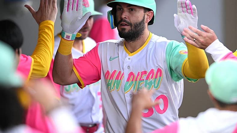 Jul 29, 2022; San Diego, California, USA; San Diego Padres first baseman Eric Hosmer (30) is congratulated in the dugout after hitting a home run against the Minnesota Twins during the fourth inning at Petco Park. Mandatory Credit: Orlando Ramirez-USA TODAY Sports