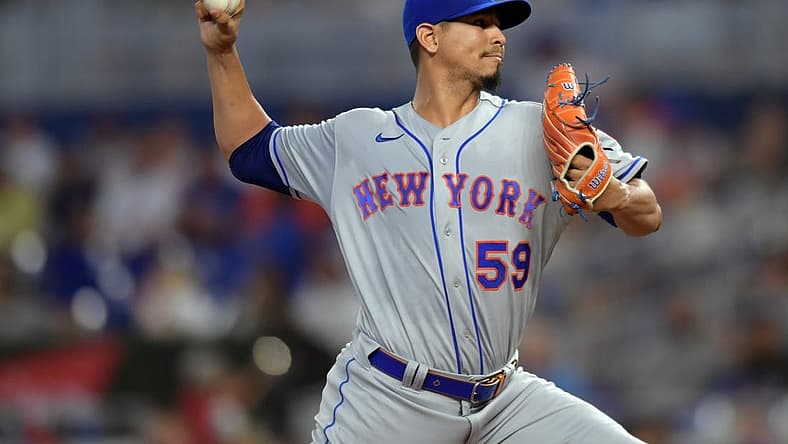 Jul 30, 2022; Miami, Florida, USA; New York Mets starting pitcher Carlos Carrasco (59) delivers against the Miami Marlins in the first inning at loanDepot Park. Mandatory Credit: Jim Rassol-USA TODAY Sports.