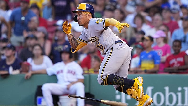 Jul 30, 2022; Boston, Massachusetts, USA; Milwaukee Brewers second baseman Kolten Wong (16) runs out a double against the Boston Red Sox during the ninth inning at Fenway Park. Mandatory Credit: Gregory Fisher-USA TODAY Sports