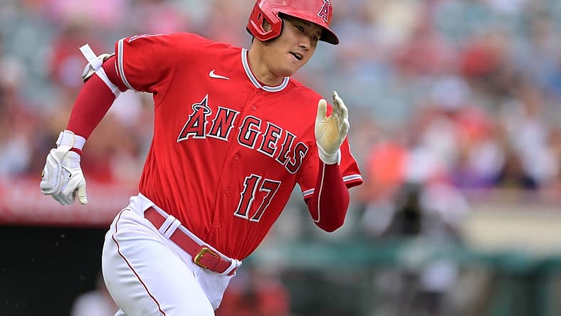 Jul 31, 2022; Anaheim, California, USA; Los Angeles Angels designated hitter Shohei Ohtani (17) rounds the bases on a triple in the first inning against the Texas Rangers at Angel Stadium. Mandatory Credit: Jayne Kamin-Oncea-USA TODAY Sports