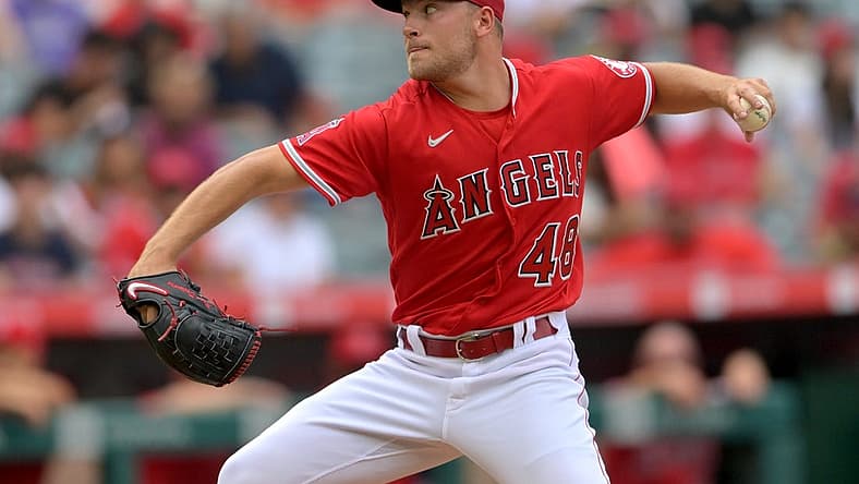 Jul 31, 2022; Anaheim, California, USA; Los Angeles Angels starting pitcher Reid Detmers (48) throws to the plate in the first inning against the Texas Rangers at Angel Stadium. Mandatory Credit: Jayne Kamin-Oncea-USA TODAY Sports