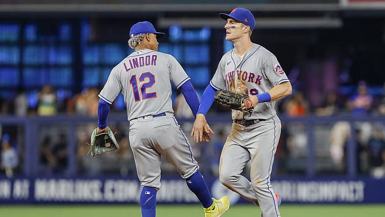 Jul 31, 2022; Miami, Florida, USA; New York Mets shortstop Francisco Lindor (12) celebrates with left fielder Mark Canha (19) after winning the game against the Miami Marlins at loanDepot Park. Mandatory Credit: Sam Navarro-USA TODAY Sports