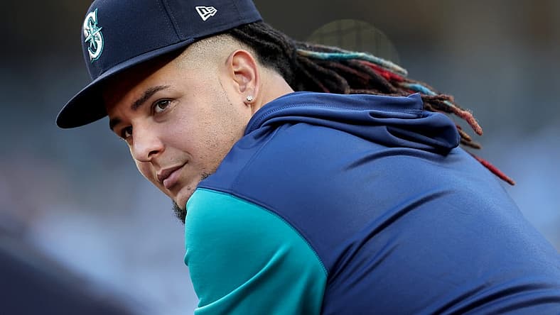 Aug 1, 2022; Bronx, New York, USA; Seattle Mariners starting pitcher Luis Castillo (21) in the dugout during the first inning against the New York Yankees at Yankee Stadium. Mandatory Credit: Brad Penner-USA TODAY Sports