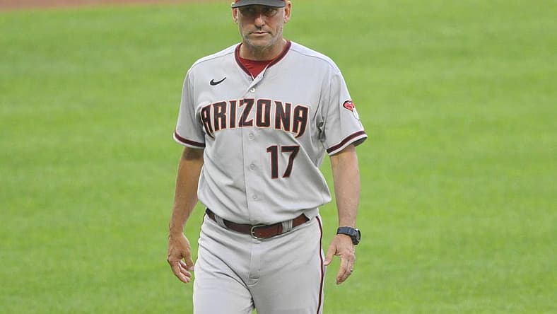 Aug 1, 2022; Cleveland, Ohio, USA; Arizona Diamondbacks manager Torey Lovullo (17) walks on the field during a pitching change in the third inning against the Cleveland Guardians at Progressive Field. Mandatory Credit: David Richard-USA TODAY Sports