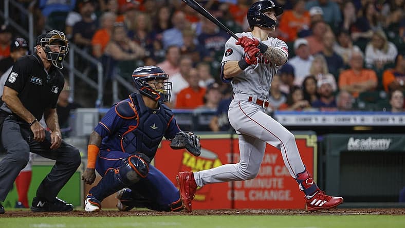 Aug 1, 2022; Houston, Texas, USA; Boston Red Sox center fielder Jarren Duran (40) hits an RBI double during the third inning against the Houston Astros at Minute Maid Park. Mandatory Credit: Troy Taormina-USA TODAY Sports