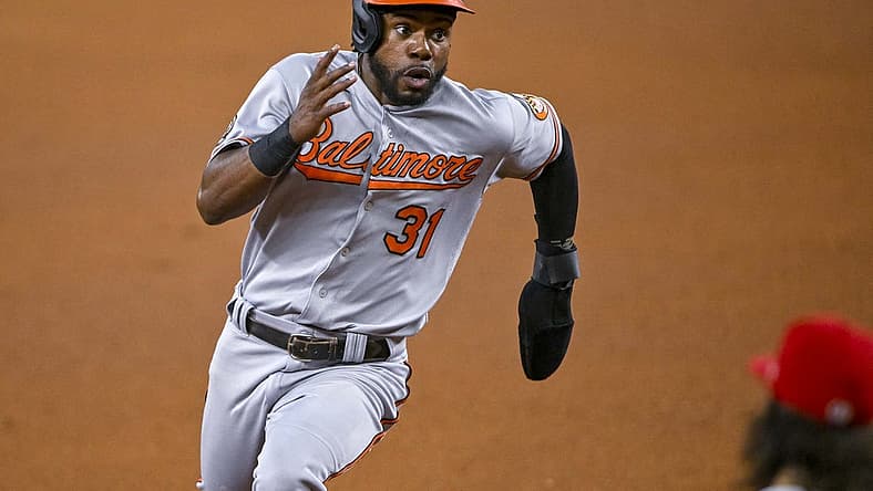 Aug 1, 2022; Arlington, Texas, USA; Baltimore Orioles center fielder Cedric Mullins (31) scores against the Texas Rangers during the fourth inning at Globe Life Field. Mandatory Credit: Jerome Miron-USA TODAY Sports