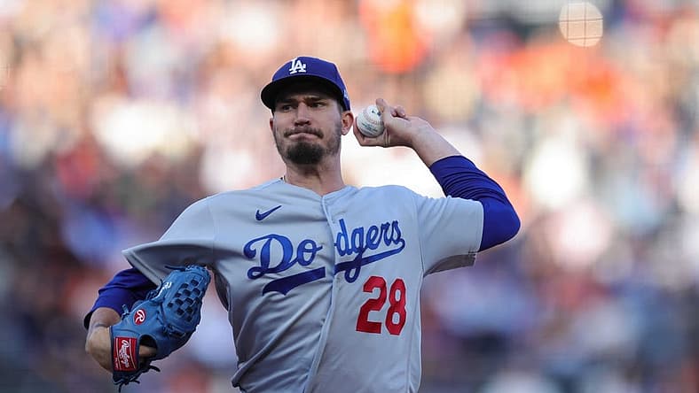 Aug 1, 2022; San Francisco, California, USA; Los Angeles Dodgers starting pitcher Andrew Heaney (28) throws a pitch during the first inning against the San Francisco Giants at Oracle Park. Mandatory Credit: Sergio Estrada-USA TODAY Sports