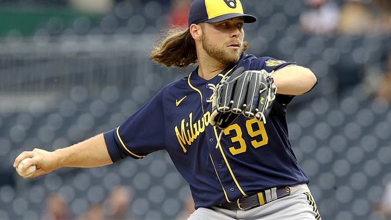 Aug 2, 2022; Pittsburgh, Pennsylvania, USA; Milwaukee Brewers starting pitcher Corbin Burnes (39) delivers a pitch against the Pittsburgh Pirates during the first inning at PNC Park. Mandatory Credit: Charles LeClaire-USA TODAY Sports