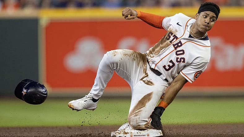 Aug 2, 2022; Houston, Texas, USA; Houston Astros shortstop Jeremy Pena (3) is tagged out by Boston Red Sox second baseman Yolmer Sanchez (47) (not pictured) trying to steal second base in the second inning at Minute Maid Park. Mandatory Credit: Thomas Shea-USA TODAY Sports