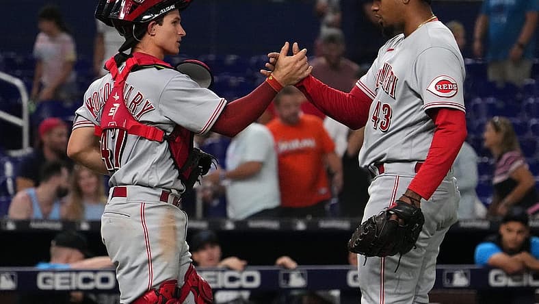 Aug 2, 2022; Miami, Florida, USA; Cincinnati Reds Alexis Diaz (43) celebrates with catcher Mark Kolozsvary (47) after defeating the Miami Marlins at loanDepot park. Mandatory Credit: Jasen Vinlove-USA TODAY Sports
