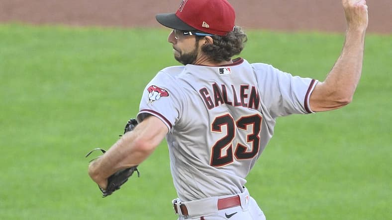 Aug 2, 2022; Cleveland, Ohio, USA; Arizona Diamondbacks starting pitcher Zac Gallen (23) delivers a pitch in the second inning against the Cleveland Guardians at Progressive Field. Mandatory Credit: David Richard-USA TODAY Sports