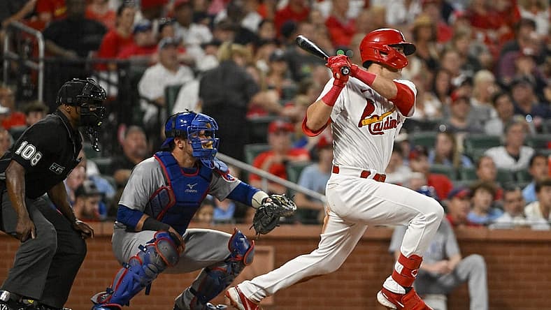 Aug 2, 2022; St. Louis, Missouri, USA; St. Louis Cardinals right fielder Lars Nootbaar (21) hits a single against the Chicago Cubs during the fifth inning at Busch Stadium. Mandatory Credit: Jeff Curry-USA TODAY Sports