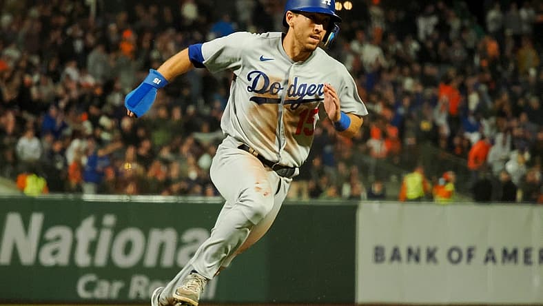 Aug 2, 2022; San Francisco, California, USA; Los Angeles Dodgers catcher Austin Barnes (15) rounds third base against the San Francisco Giants during the eighth inning at Oracle Park. Mandatory Credit: Kelley L Cox-USA TODAY Sports