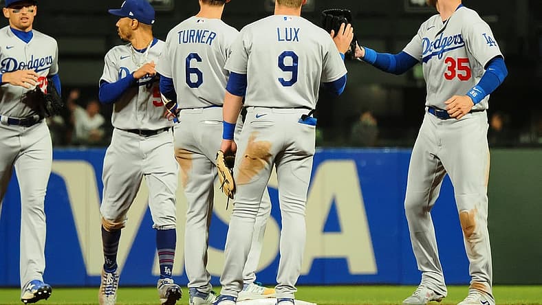 Aug 2, 2022; San Francisco, California, USA; Los Angeles Dodgers players celebrate after a win against the San Francisco Giants at Oracle Park. Mandatory Credit: Kelley L Cox-USA TODAY Sports