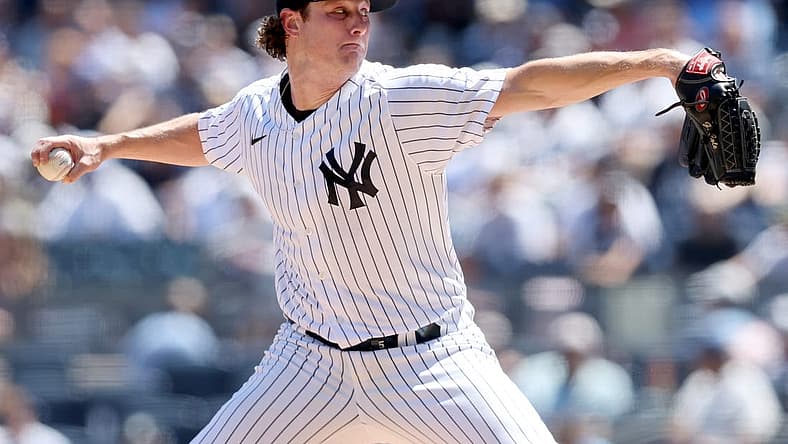 Aug 3, 2022; Bronx, New York, USA; New York Yankees starting pitcher Gerrit Cole (45) pitches against the Seattle Mariners during the first inning at Yankee Stadium. Mandatory Credit: Brad Penner-USA TODAY Sports