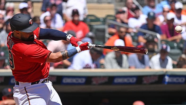 Aug 3, 2022; Minneapolis, Minnesota, USA; Minnesota Twins catcher Sandy Leon (39) hits a two-run RBI double against the Detroit Tigers during the second inning at Target Field. Mandatory Credit: Nick Wosika-USA TODAY Sports