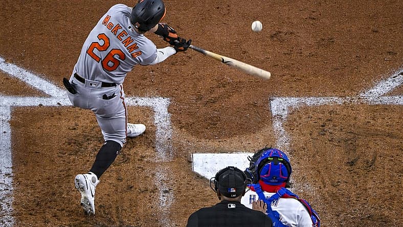 Aug 3, 2022; Arlington, Texas, USA; Baltimore Orioles left fielder Ryan McKenna (26) hits a home run against the Texas Rangers during the second inning at Globe Life Field. Mandatory Credit: Jerome Miron-USA TODAY Sports