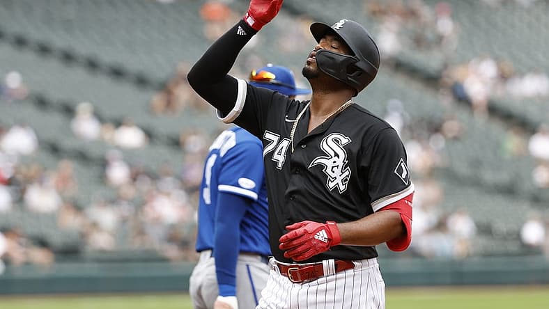 Aug 3, 2022; Chicago, Illinois, USA; Chicago White Sox left fielder Eloy Jimenez (74) reacts after hitting a single against the Kansas City Royals during the fifth inning at Guaranteed Rate Field. Mandatory Credit: Kamil Krzaczynski-USA TODAY Sports