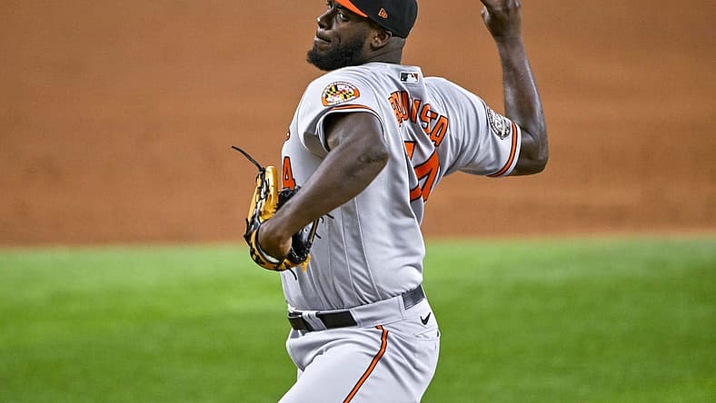Aug 3, 2022; Arlington, Texas, USA; Baltimore Orioles relief pitcher Felix Bautista (74) pitches against the Texas Rangers during the ninth inning at Globe Life Field. Mandatory Credit: Jerome Miron-USA TODAY Sports
