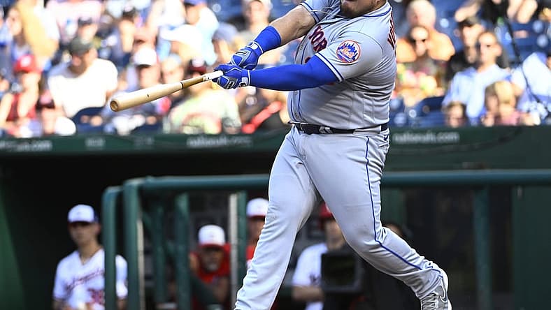 Aug 3, 2022; Washington, District of Columbia, USA; New York Mets designated hitter Daniel Vogelbach (32) hits a grand slam against the Washington Nationals during the fifth inning at Nationals Park. Mandatory Credit: Brad Mills-USA TODAY Sports
