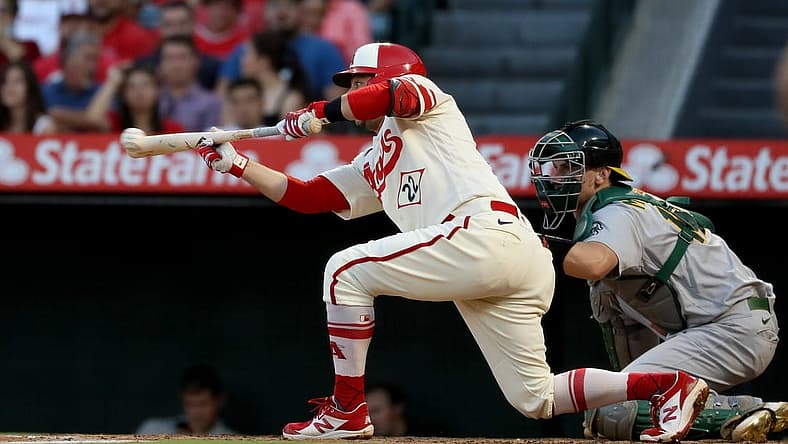 Aug 3, 2022; Anaheim, California, USA;  Los Angeles Angels second baseman David Fletcher (22) sacrifice bunt during the third inning against the Oakland Athletics at Angel Stadium. Mandatory Credit: Kiyoshi Mio-USA TODAY Sports
