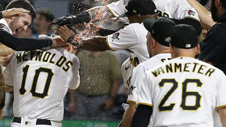 Aug 3, 2022; Pittsburgh, Pennsylvania, USA; Pittsburgh Pirates center fielder Bryan Reynolds (10) crosses home plate on a game winning walk off home run against the Milwaukee Brewers during the ninth inning at PNC Park. The Pirates won 8-7. Mandatory Credit: Charles LeClaire-USA TODAY Sports