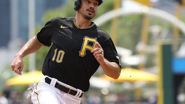 Aug 4, 2022; Pittsburgh, Pennsylvania, USA; Pittsburgh Pirates center fielder Bryan Reynolds (10) runs from first base to third base against the Milwaukee Brewers during the first inning at PNC Park. Mandatory Credit: Charles LeClaire-USA TODAY Sports