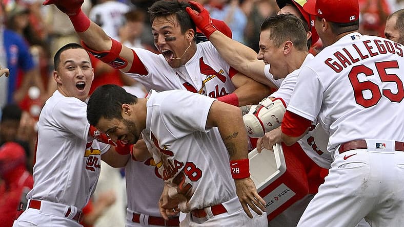 Aug 4, 2022; St. Louis, Missouri, USA; St. Louis Cardinals right fielder Lars Nootbaar (21) celebrates with teammates after hitting a walk-off one run single against the Chicago Cubs during the ninth inning at Busch Stadium. Mandatory Credit: Jeff Curry-USA TODAY Sports