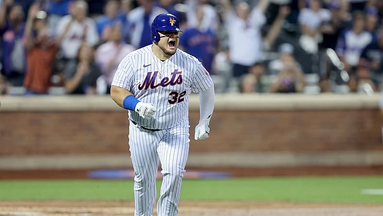 Aug 4, 2022; New York City, New York, USA; New York Mets designated hitter Daniel Vogelbach (32) reacts after hitting a solo home run against the Atlanta Braves during the third inning at Citi Field. Mandatory Credit: Brad Penner-USA TODAY Sports
