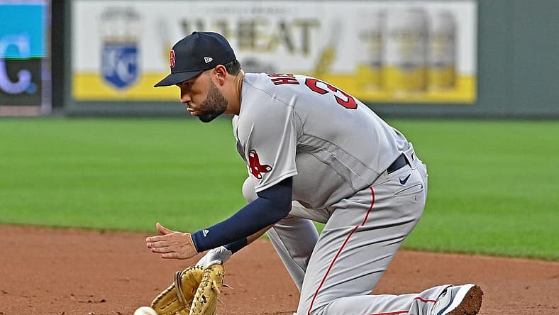 Aug 4, 2022; Kansas City, Missouri, USA; Boston Red Sox first baseman Eric Hosmer (35) fields a ground ball during the third inning against the Kansas City Royals at Kauffman Stadium. Mandatory Credit: Peter Aiken-USA TODAY Sports