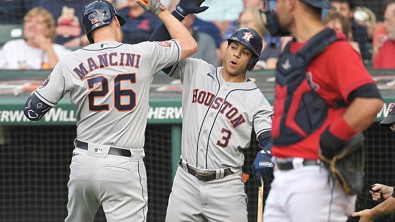 Aug 5, 2022; Cleveland, Ohio, USA; Houston Astros designated hitter Trey Mancini (26) celebrates with shortstop Jeremy Pena (3) after hitting a home run during the second inning against the Cleveland Guardians at Progressive Field. Mandatory Credit: Ken Blaze-USA TODAY Sports
