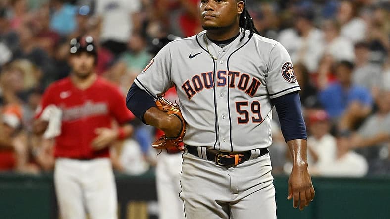 Aug 5, 2022; Cleveland, Ohio, USA; Houston Astros starting pitcher Framber Valdez (59) reacts after giving up a run during the seventh inning against the Cleveland Guardians at Progressive Field. Mandatory Credit: Ken Blaze-USA TODAY Sports