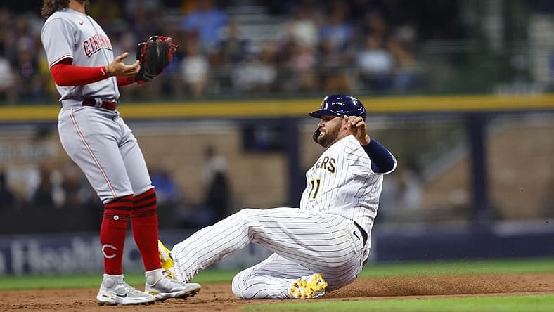 Aug 5, 2022; Milwaukee, Wisconsin, USA;  Milwaukee Brewers first baseman Rowdy Tellez (11) steals second base during the third inning against the Cincinnati Reds at American Family Field. Mandatory Credit: Jeff Hanisch-USA TODAY Sports