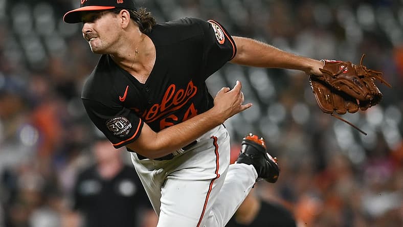 Aug 5, 2022; Baltimore, Maryland, USA; Baltimore Orioles starting pitcher Dean Kremer (64) throws a first inning pitch against the Pittsburgh Pirates  at Oriole Park at Camden Yards. Mandatory Credit: Tommy Gilligan-USA TODAY Sports