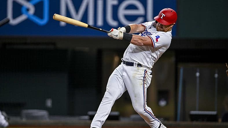 Aug 1, 2022; Arlington, Texas, USA; Texas Rangers right fielder Kole Calhoun (56) in action during the game between the Texas Rangers and the Baltimore Orioles at Globe Life Field. Mandatory Credit: Jerome Miron-USA TODAY Sports