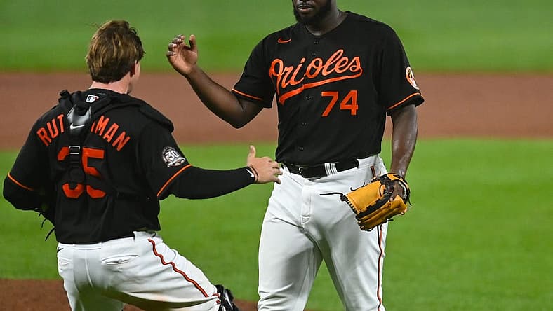 Aug 5, 2022; Baltimore, Maryland, USA; Baltimore Orioles relief pitcher Felix Bautista (74) celebrates with catcher Adley Rutschman (35) after the game against the Pittsburgh Pirates at Oriole Park at Camden Yards. Mandatory Credit: Tommy Gilligan-USA TODAY Sports