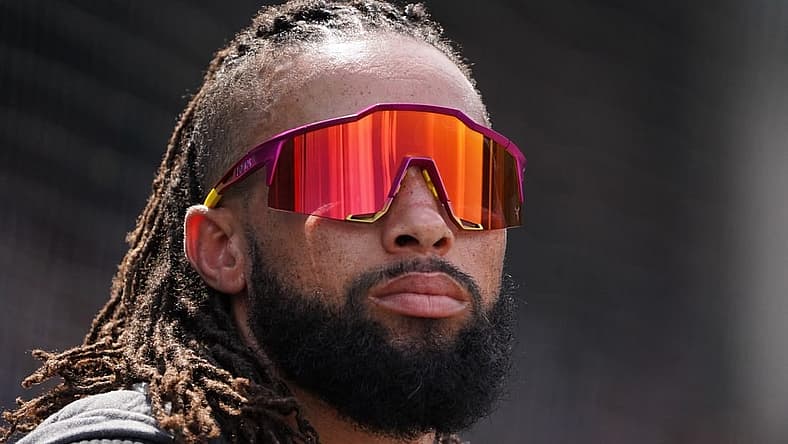 Aug 6, 2022; Chicago, Illinois, USA; Miami Marlins left fielder Billy Hamilton (6) in the dugout during the fourth inning against the Chicago Cubs at Wrigley Field. Mandatory Credit: David Banks-USA TODAY Sports