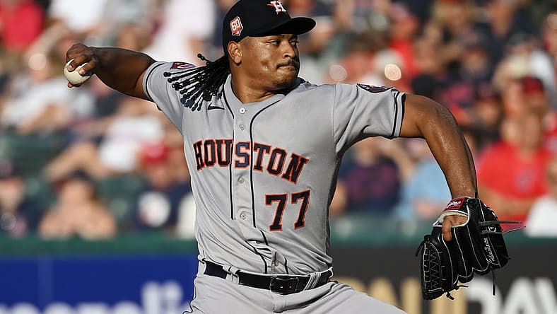 Aug 6, 2022; Cleveland, Ohio, USA; Houston Astros starting pitcher Luis Garcia (77) throws a pitch during the second inning against the Cleveland Guardians at Progressive Field. Mandatory Credit: Ken Blaze-USA TODAY Sports