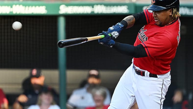 Aug 6, 2022; Cleveland, Ohio, USA; Cleveland Guardians third baseman Jose Ramirez (11) hits a single during the fourth inning against the Houston Astros at Progressive Field. Mandatory Credit: Ken Blaze-USA TODAY Sports