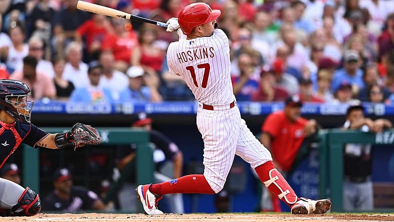 Aug 6, 2022; Philadelphia, Pennsylvania, USA; Philadelphia Phillies first baseman Rhys Hoskins (17) hits a home run against the Washington Nationals in the first inning at Citizens Bank Park. Mandatory Credit: Kyle Ross-USA TODAY Sports