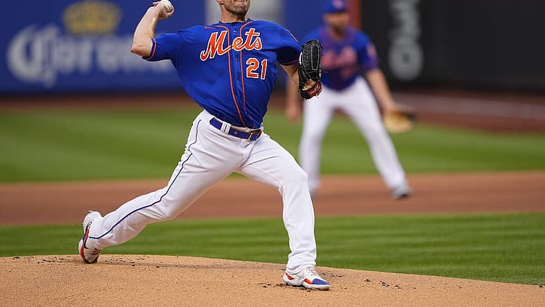 Aug 6, 2022; New York City, New York, USA; New York Mets pitcher Max Scherzer (21) delivers a pitch against the Atlanta Braves during the first inning at Citi Field. Mandatory Credit: Gregory Fisher-USA TODAY Sports
