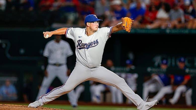 Aug 6, 2022; Arlington, Texas, USA; Texas Rangers starting pitcher Dane Dunning (33) throws against the Chicago White Sox during the fourth inning at Globe Life Field. Mandatory Credit: Andrew Dieb-USA TODAY Sports