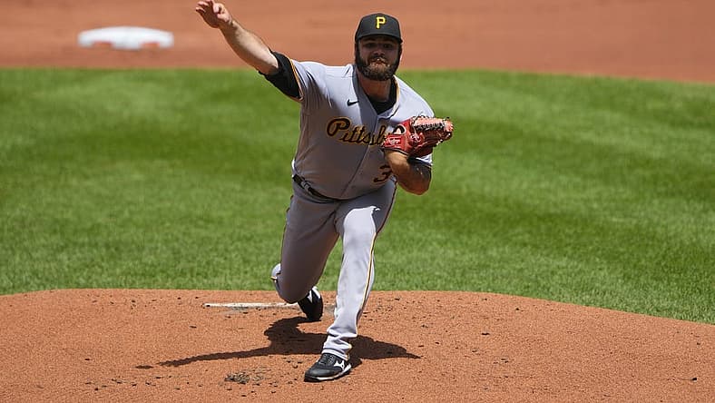 Aug 7, 2022; Baltimore, Maryland, USA; Pittsburgh Pirates pitcher Bryse Wilson (32) delivers a pitch against the Baltimore Orioles during the first inning at Oriole Park at Camden Yards. Mandatory Credit: Gregory Fisher-USA TODAY Sports